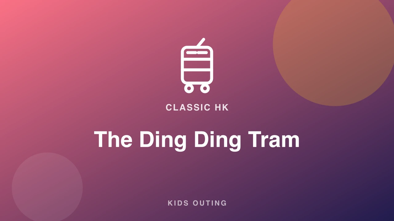A vintage double-decker tram on a Hong Kong Island street